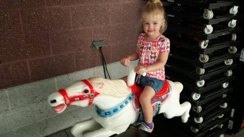 Tiny Lily on a coin horse